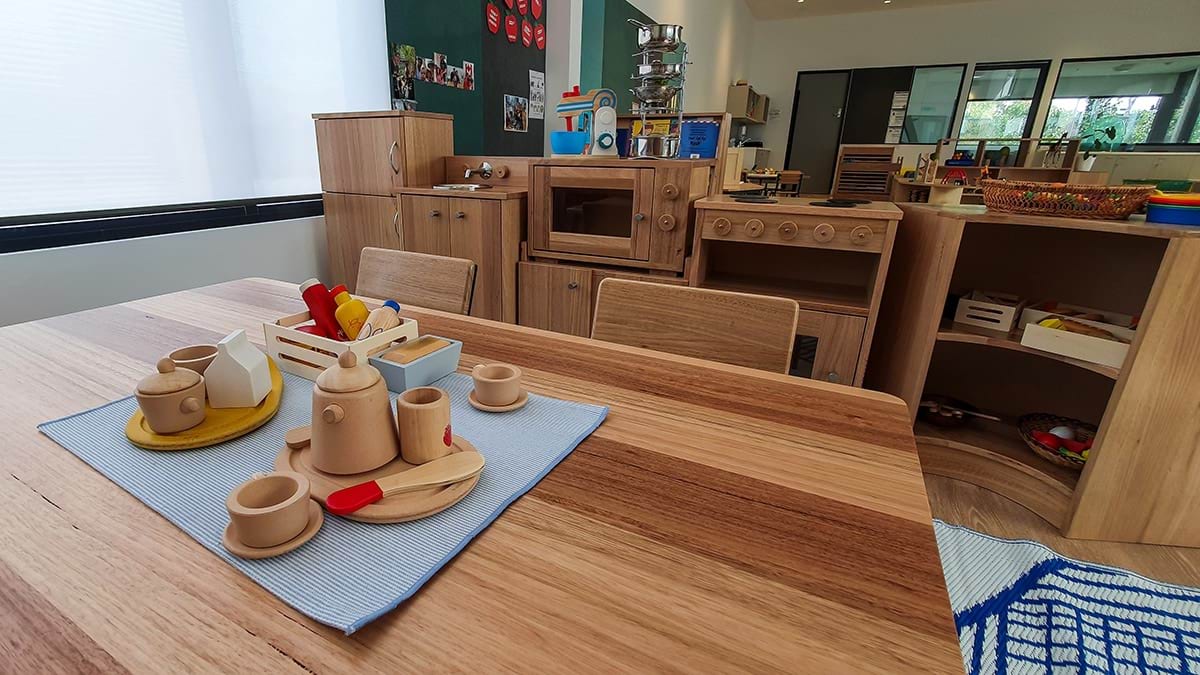 Billy Button Children’s Centre - new centre, photograph of playroom wooden kitchen