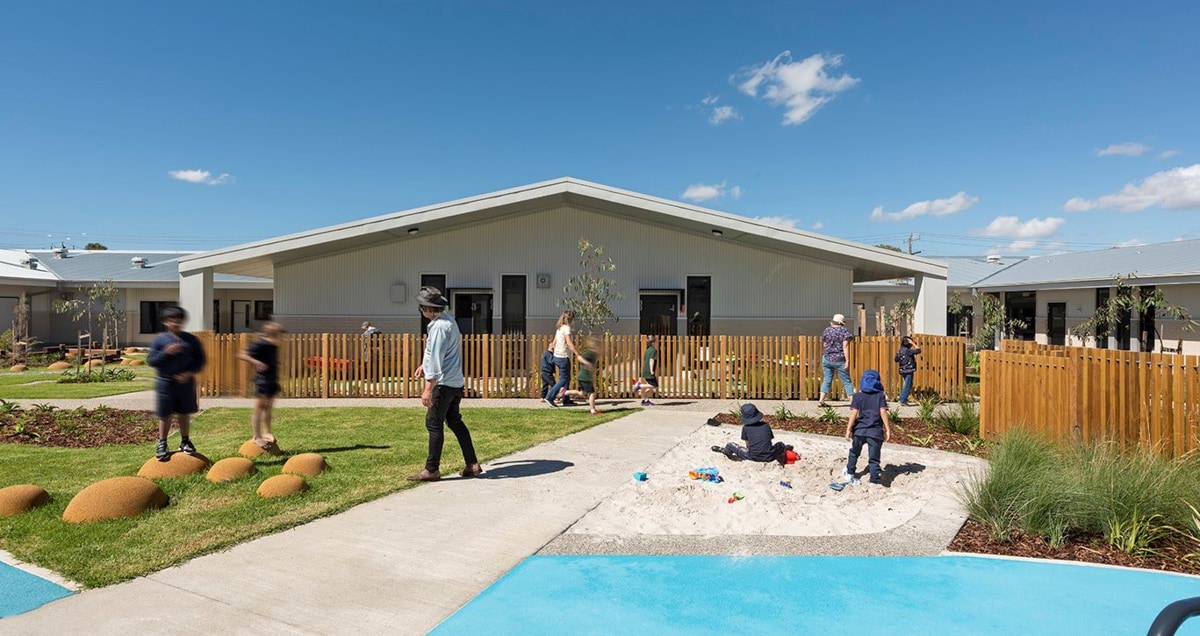 Photo of student playing in the sensory play area