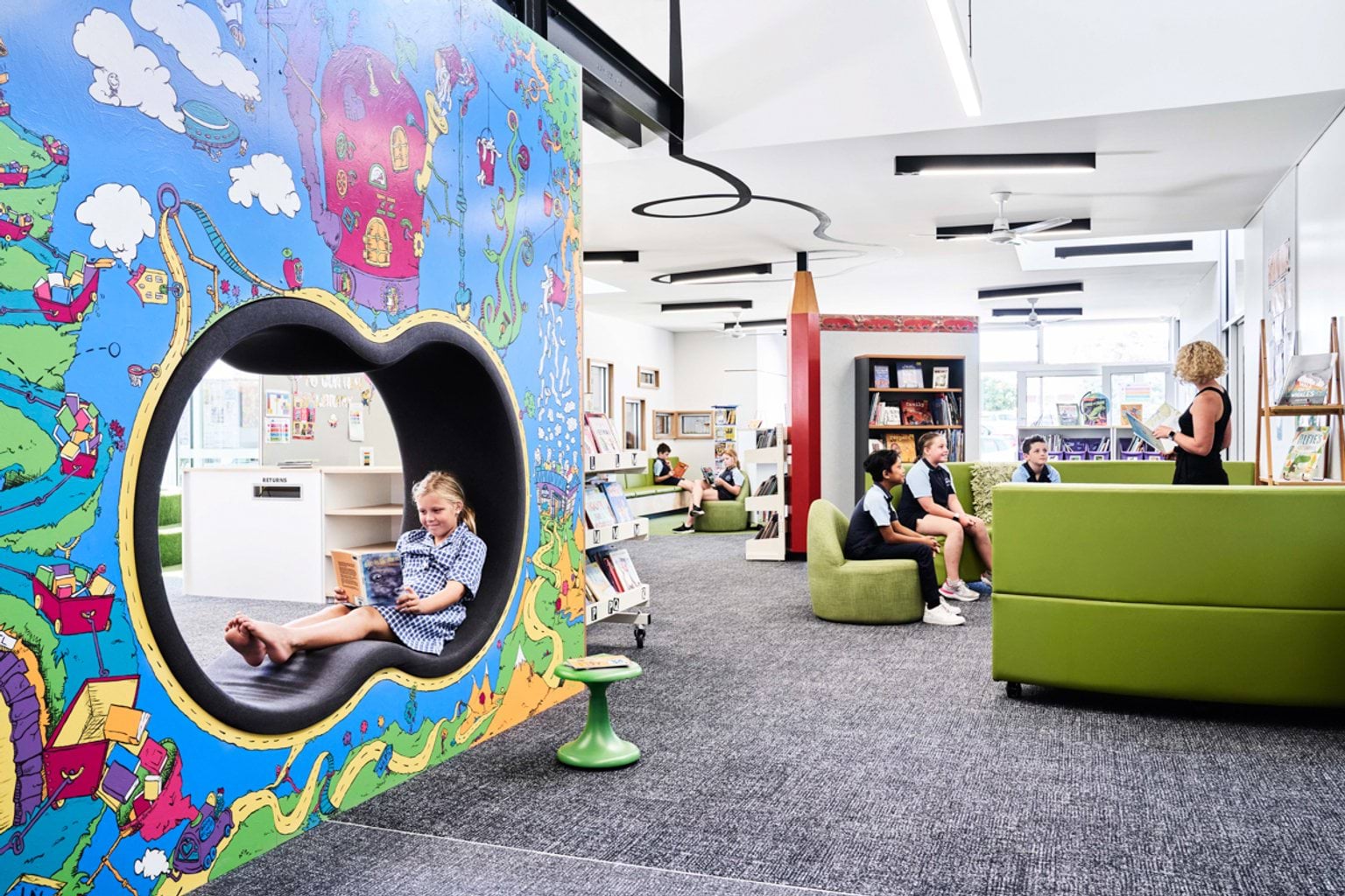 Photo of students and teacher in a learning environment