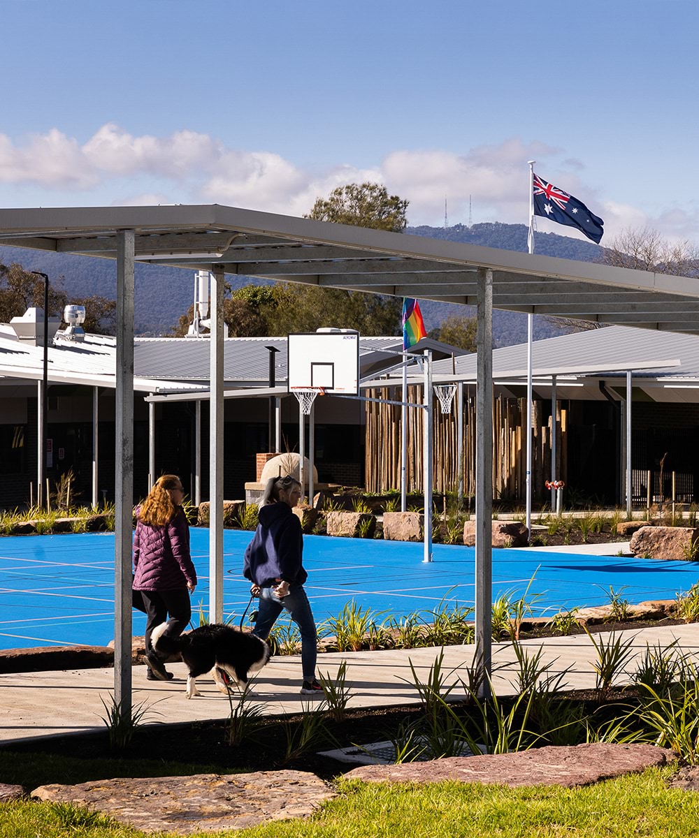 Croydon Community School - completed upgrade, photograph of outdoor paved area and sports courts