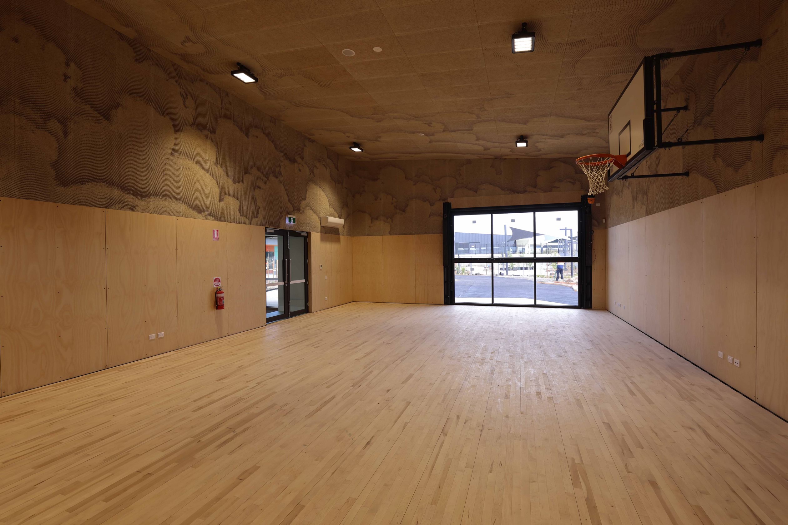 Warringa Park School - Polly Parade campus construction, photograph of interior sports court, basketball