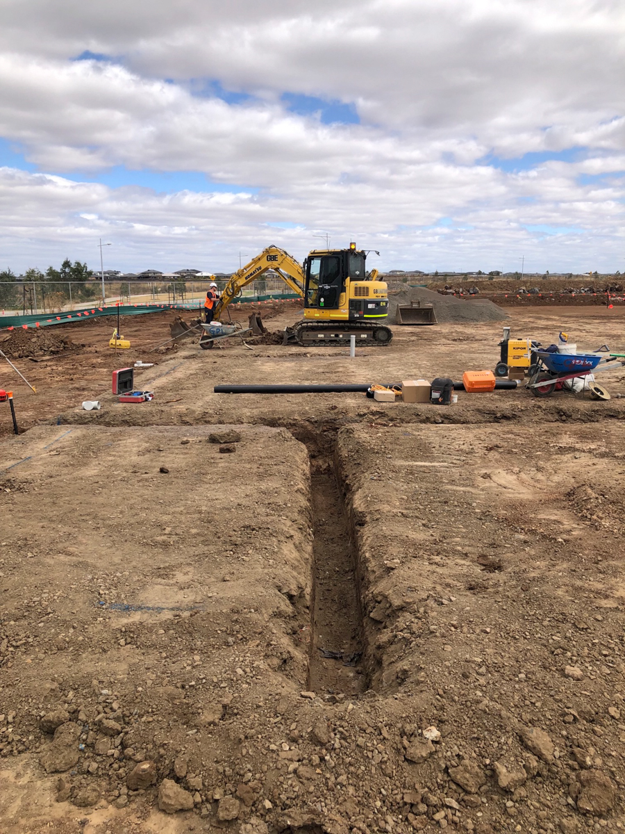 Lollypop Creek Secondary School (interim name) - construction photo of site progress in February 2023 - digging channels