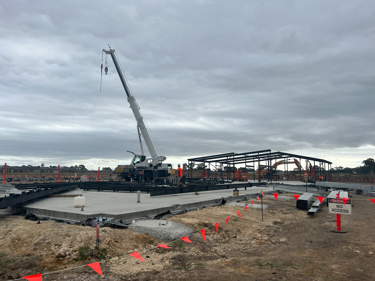 Officer Brunt Road Primary School (interim name) - construction photo of site progress in February 2023 - crane and site foundations