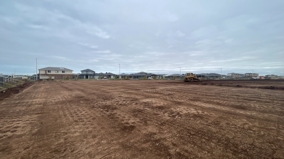 Riverdale Secondary School (interim name) - construction photo of site progress in January 2023 - image showing a levelled earth building site