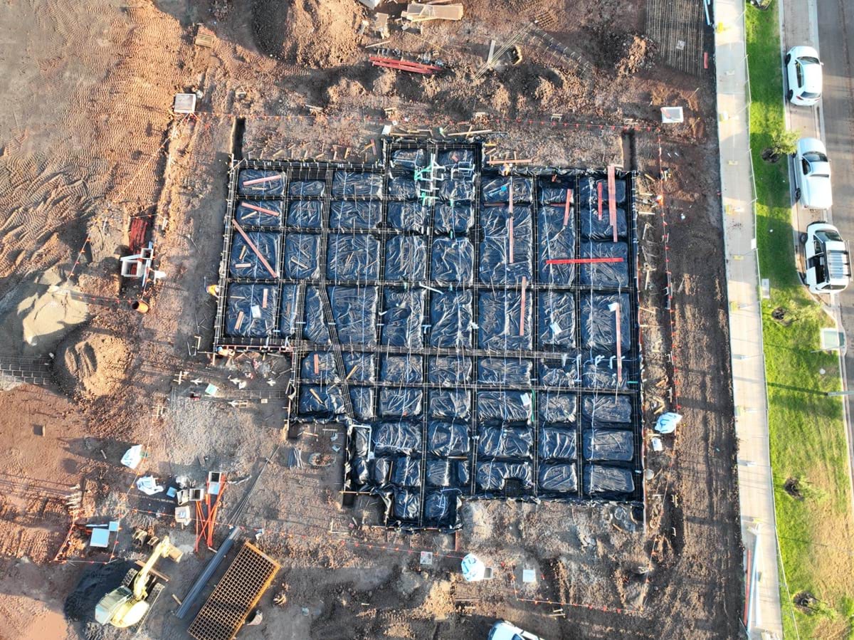 Tarneit North Primary School kindergarten (interim name) - construction photo of site progress in February 2023 - aerial shot of site