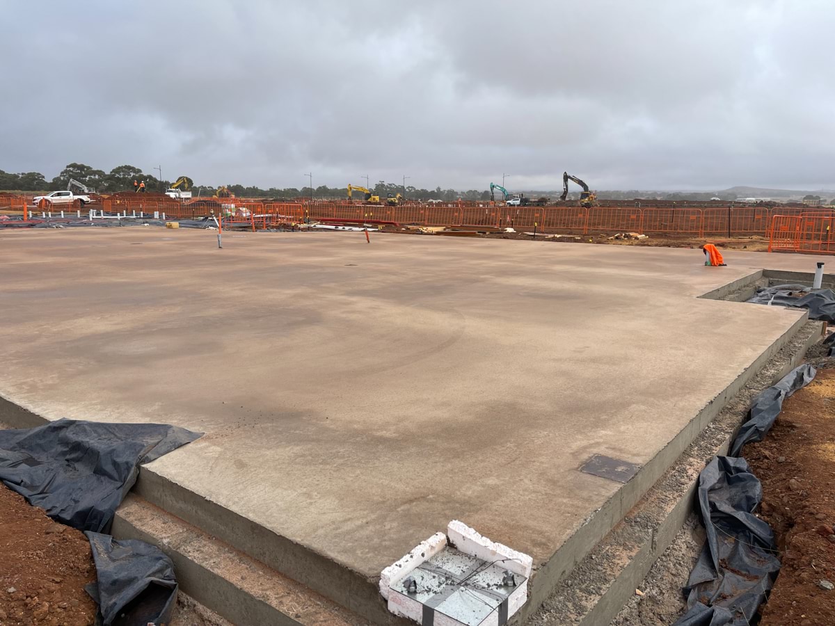 Aintree Secondary School (interim name) - construction photo of site progress in March 2023, showing newly levelled concrete