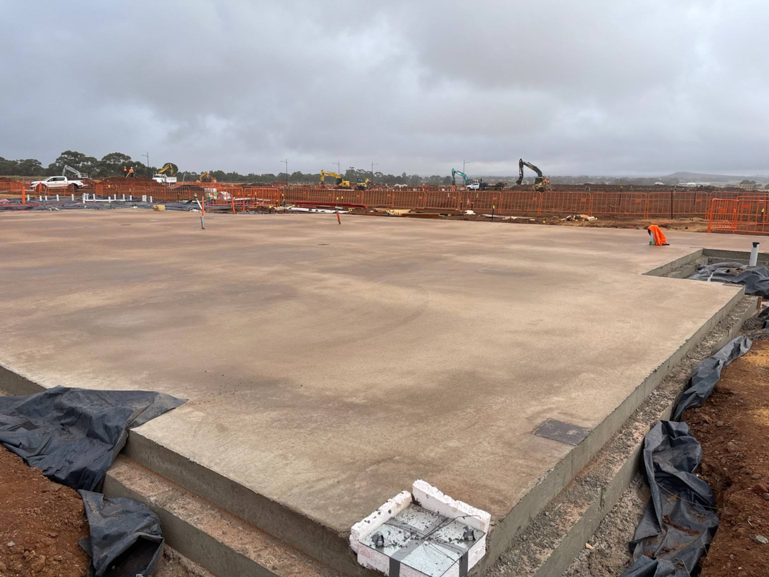 Aintree Secondary School (interim name) - construction photo of site progress in March 2023, showing newly levelled concrete