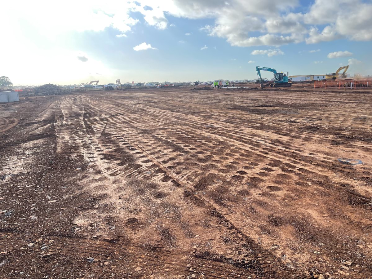 Aintree Specialist School (interim name) - construction photo of site progress in February 2023 showing a levelled earth surface