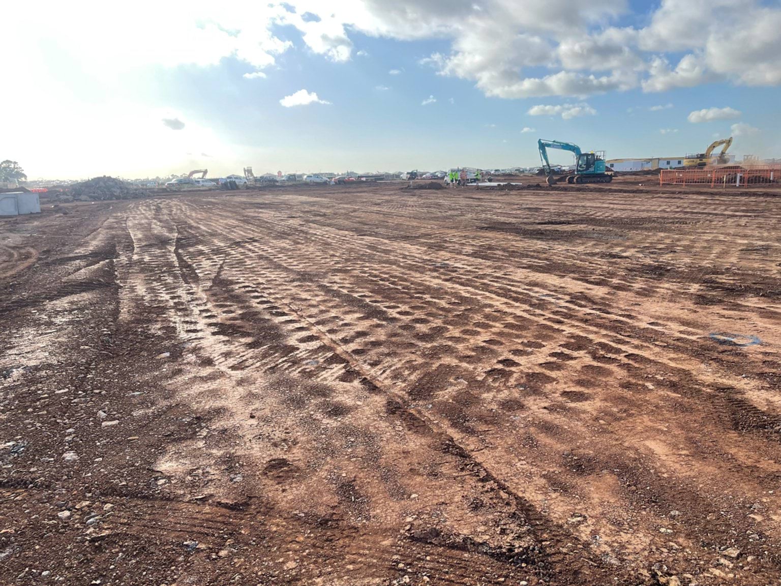 Aintree Specialist School (interim name) - construction photo of site progress in February 2023 showing a levelled earth surface