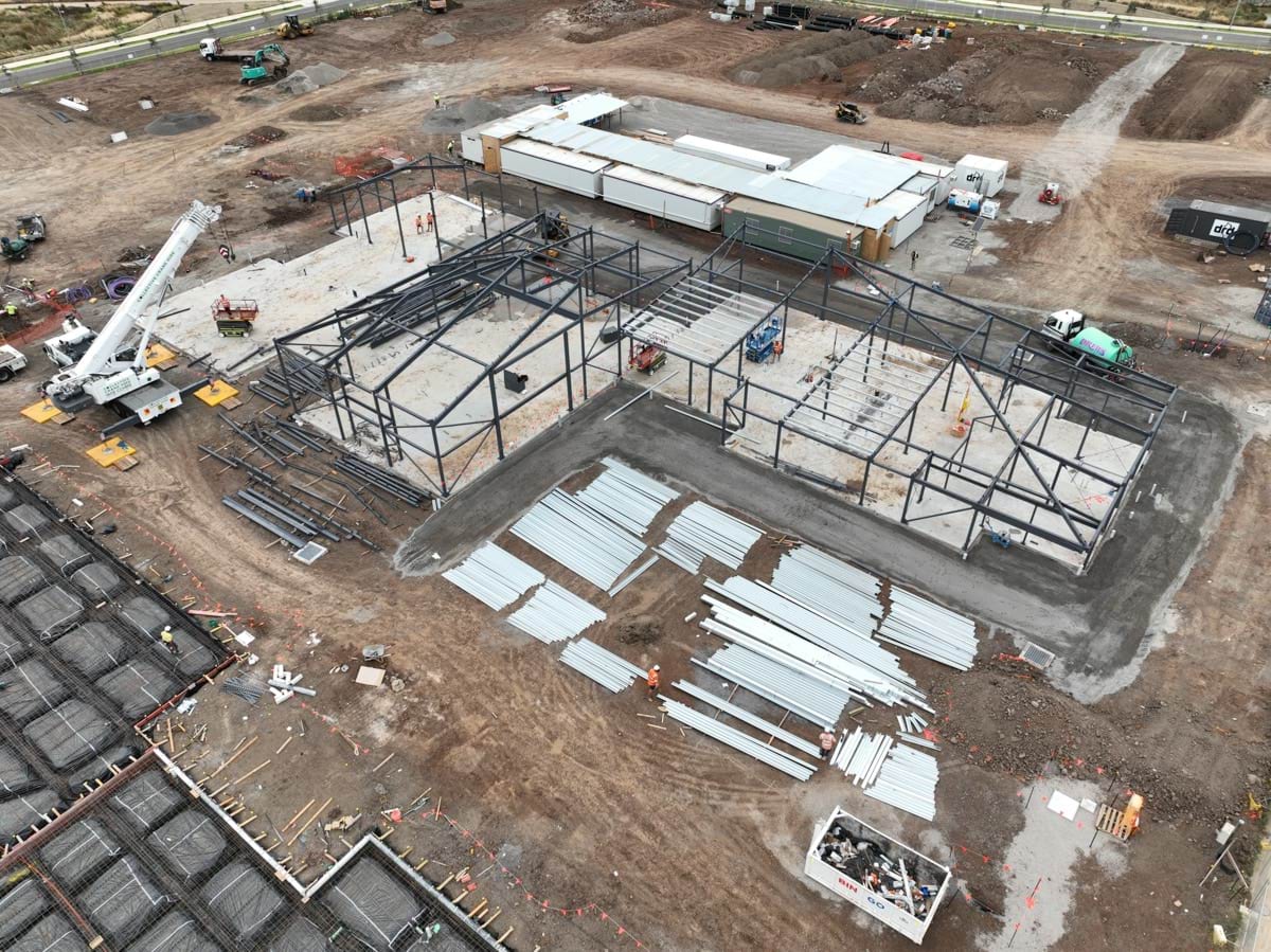 Black Forest East Primary School (interim name) - construction site progress in March 2023 - aerial shot of site showing the steel frameworks of school buildings