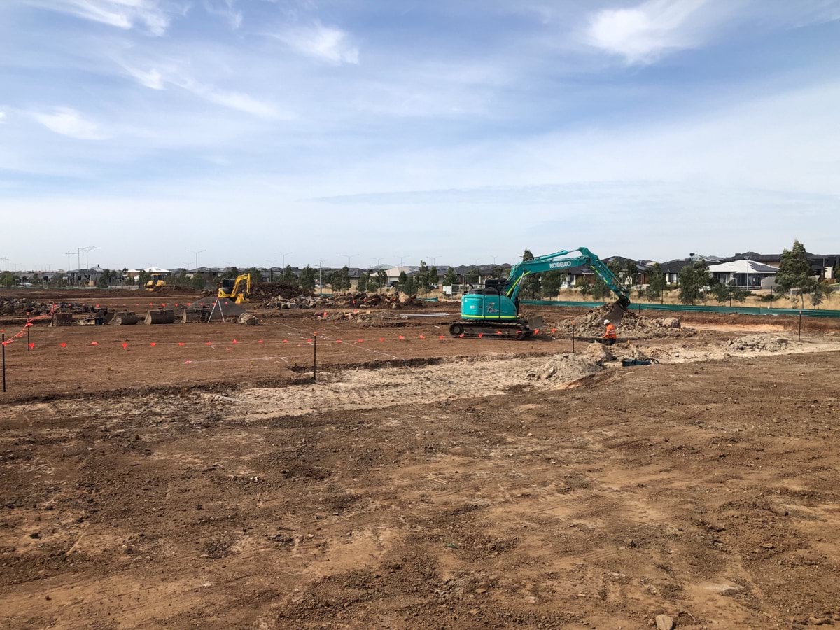 Lollypop Creek Specialist School (interim name) - construction photo of site progress in February 2023 - mechanical digger working on site