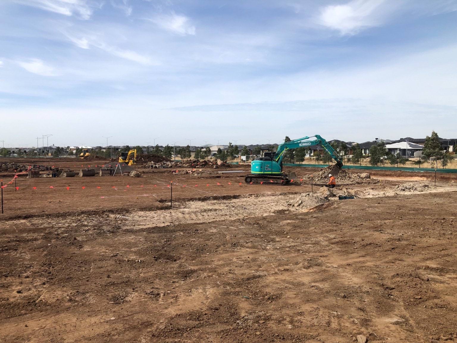 Lollypop Creek Specialist School (interim name) - construction photo of site progress in February 2023 - mechanical digger working on site