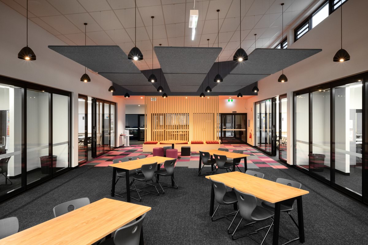 Lyndale Secondary College - photo of the interior of a large learning space with tables and chairs