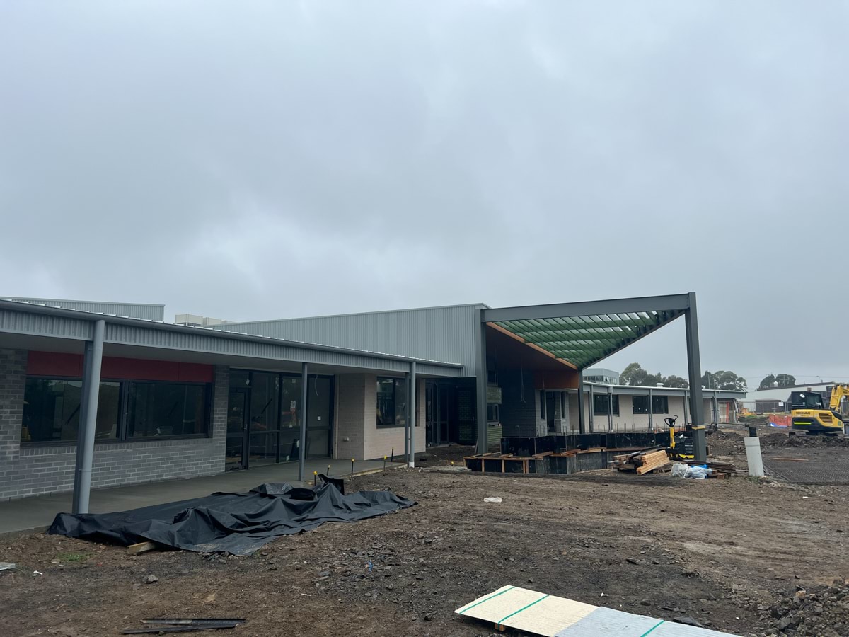 Peter Lalor Secondary College - construction photo of site progress in March 2023 - exterior of a school building