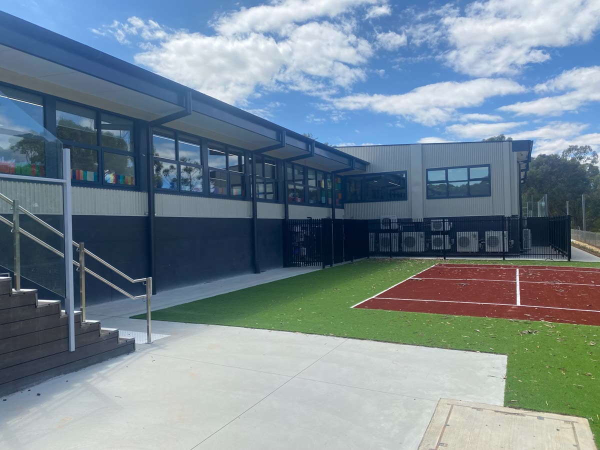 Puckapunyal Primary School - photo of a school building backing onto the outdoor sports area