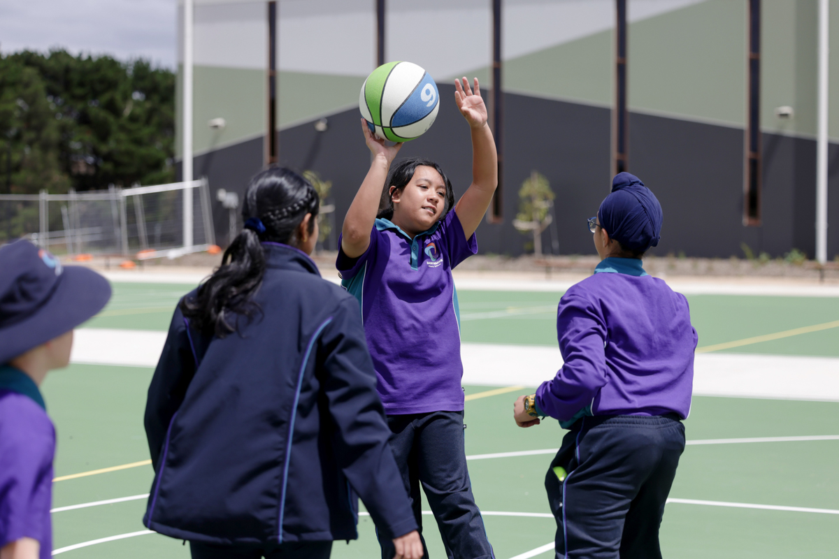 Banum Warrik Primary School – official opening, students playing on the outdoor court