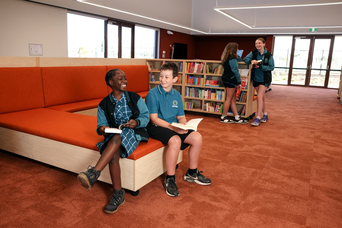 Binap Primary School – official opening, students enjoying the library