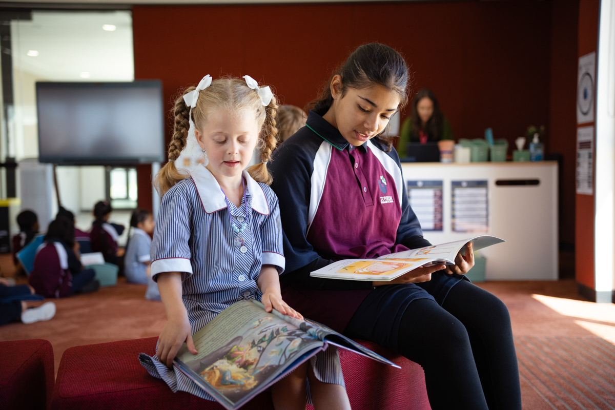 Topirum Primary School – official opening, students spending time in their library