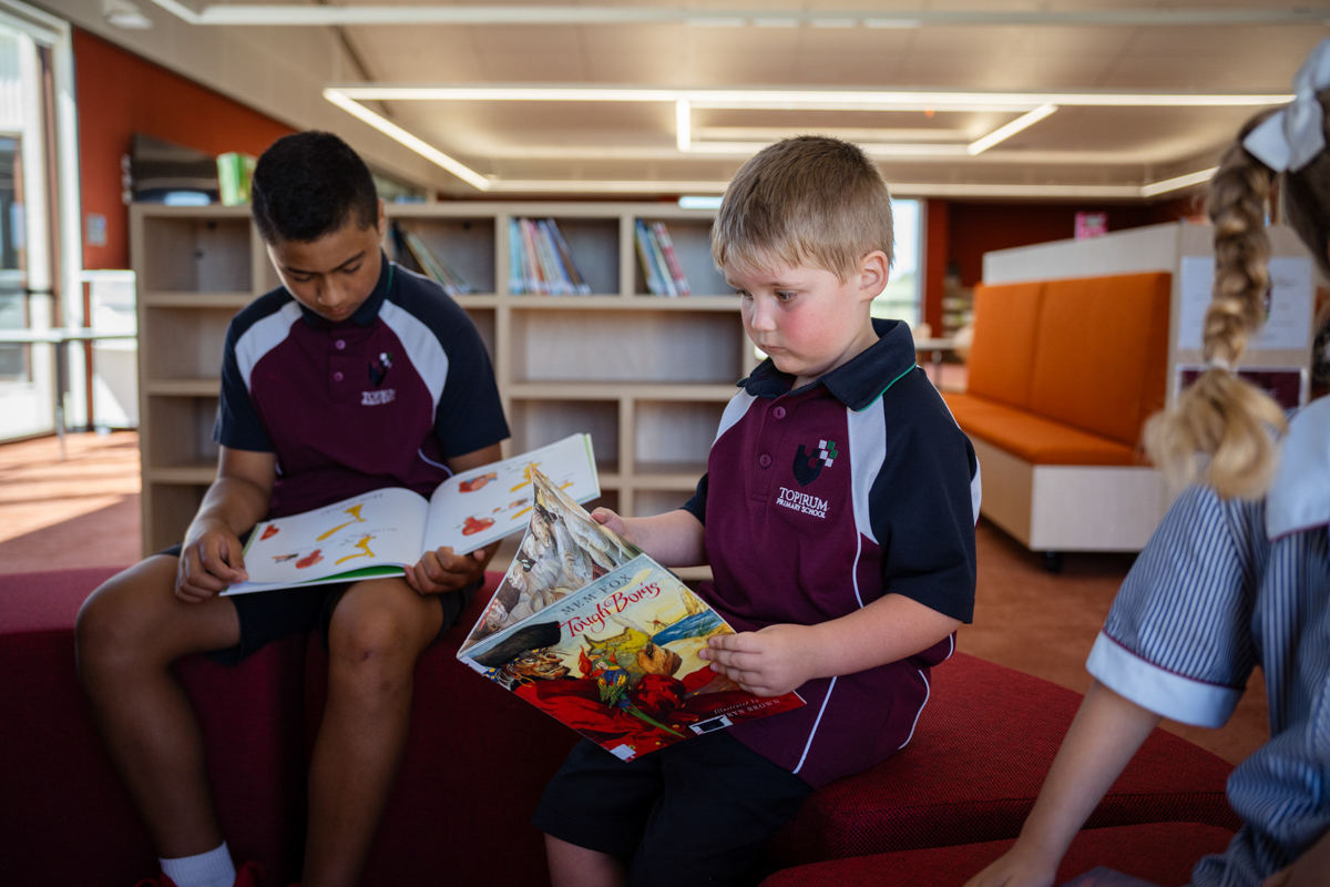 Topirum Primary School – official opening, students spending time in their library