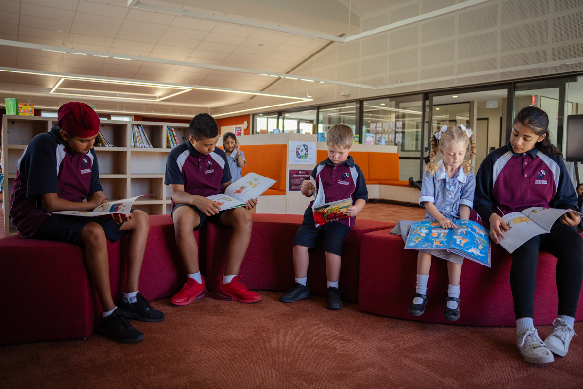 Topirum Primary School – official opening, students spending time in their library