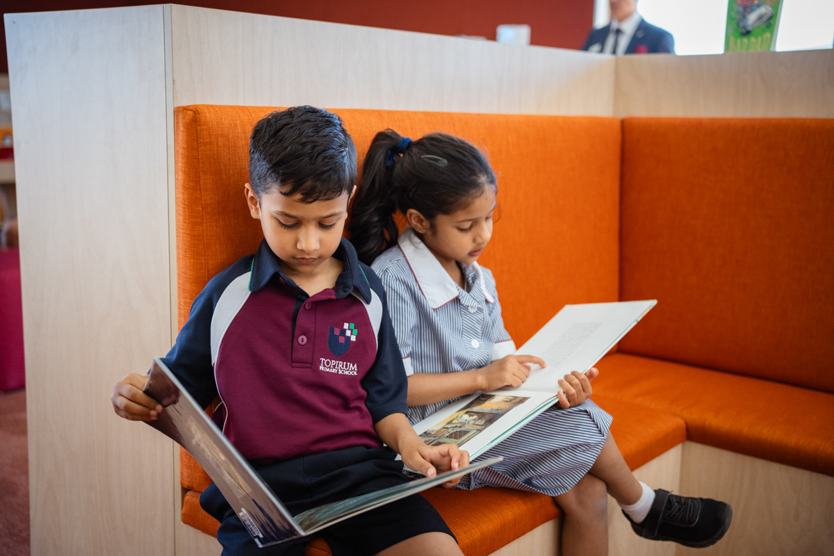 Topirum Primary School – official opening, students spending time in their library