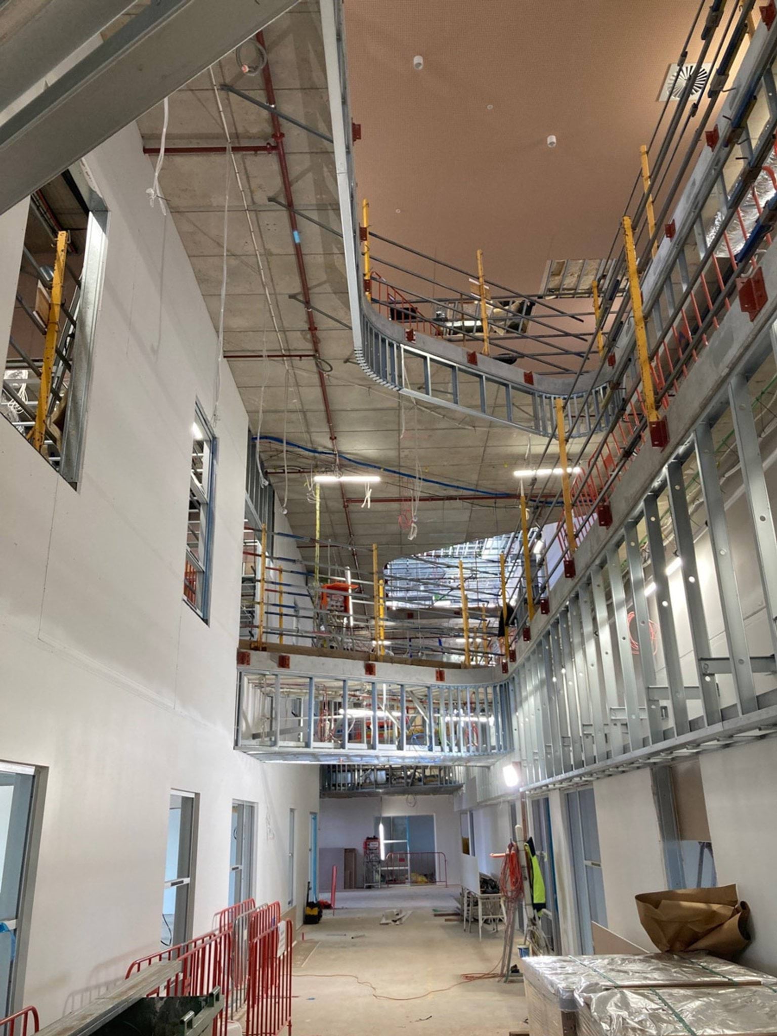 Interior atrium with scaffolding up to complete internal three floors and mezzanine