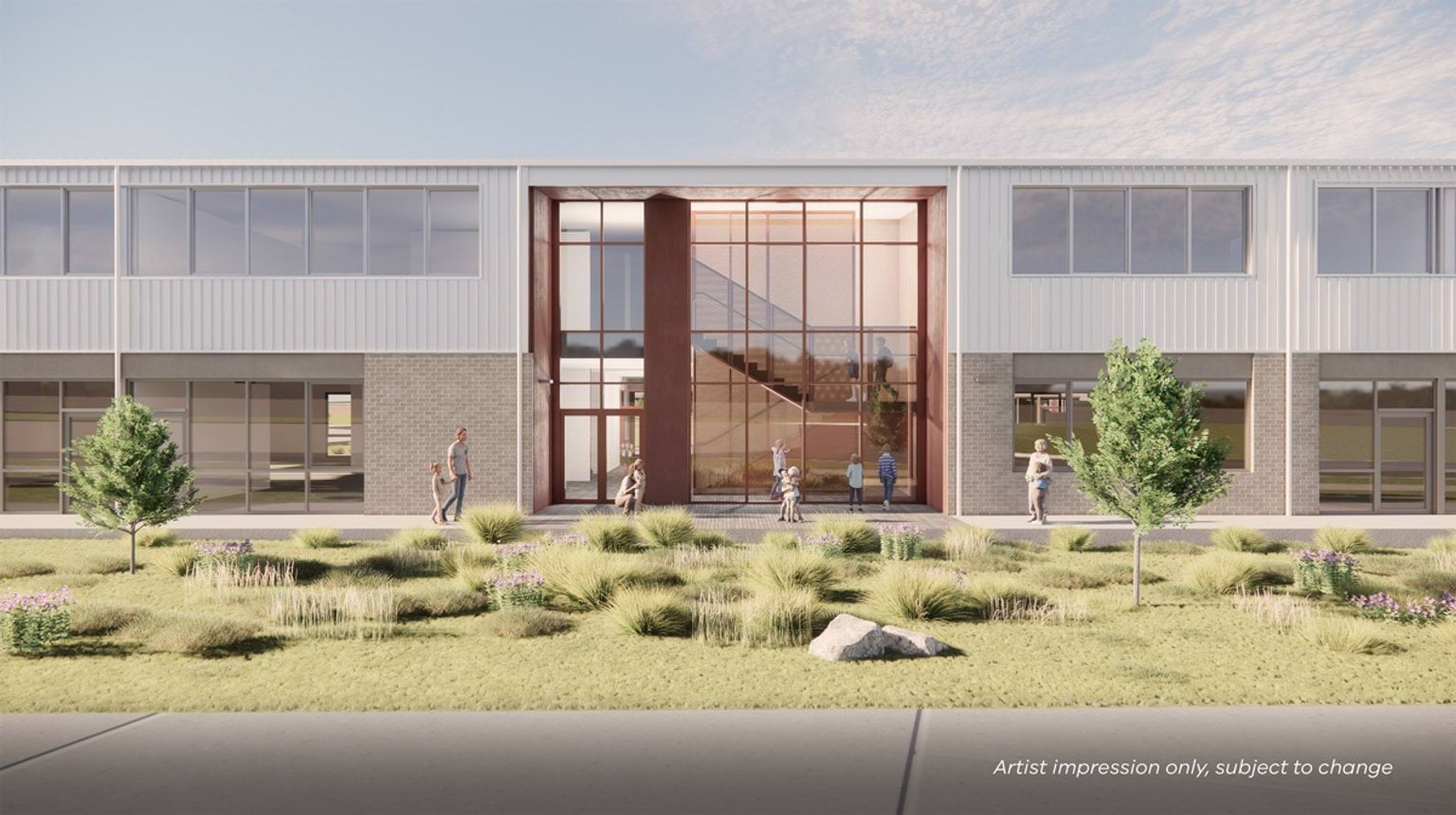 Render of exterior of school building. It is two levels and is white with red details.