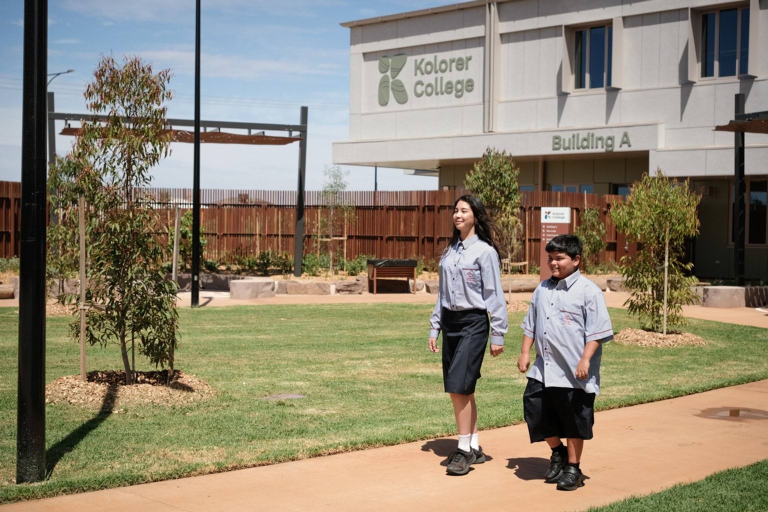 Students walking through the new school grounds