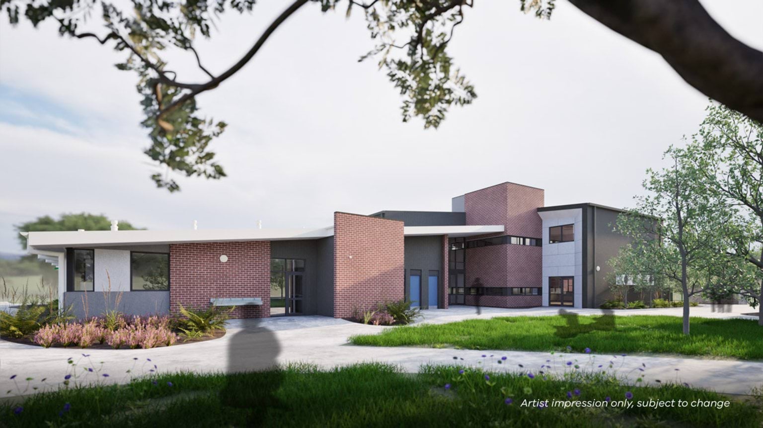 Exterior render of a contemporary school building with red brick and grey cladding, flat roofs, and landscaped courtyard.