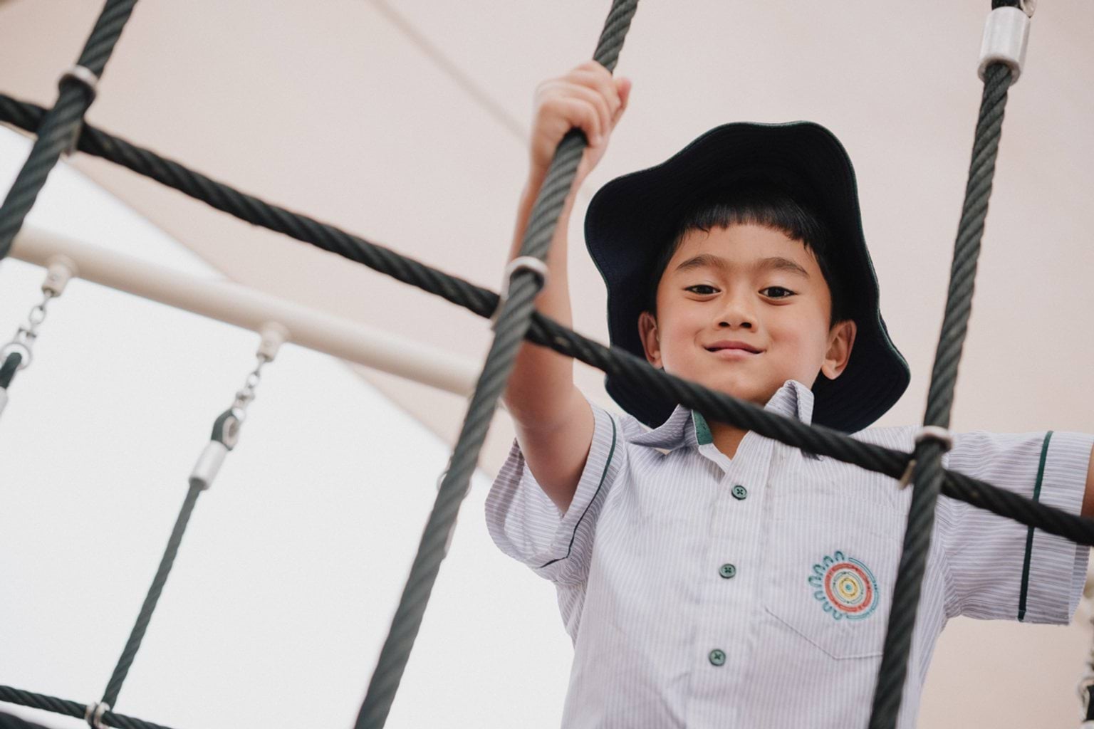 Climbing on the rope bridge