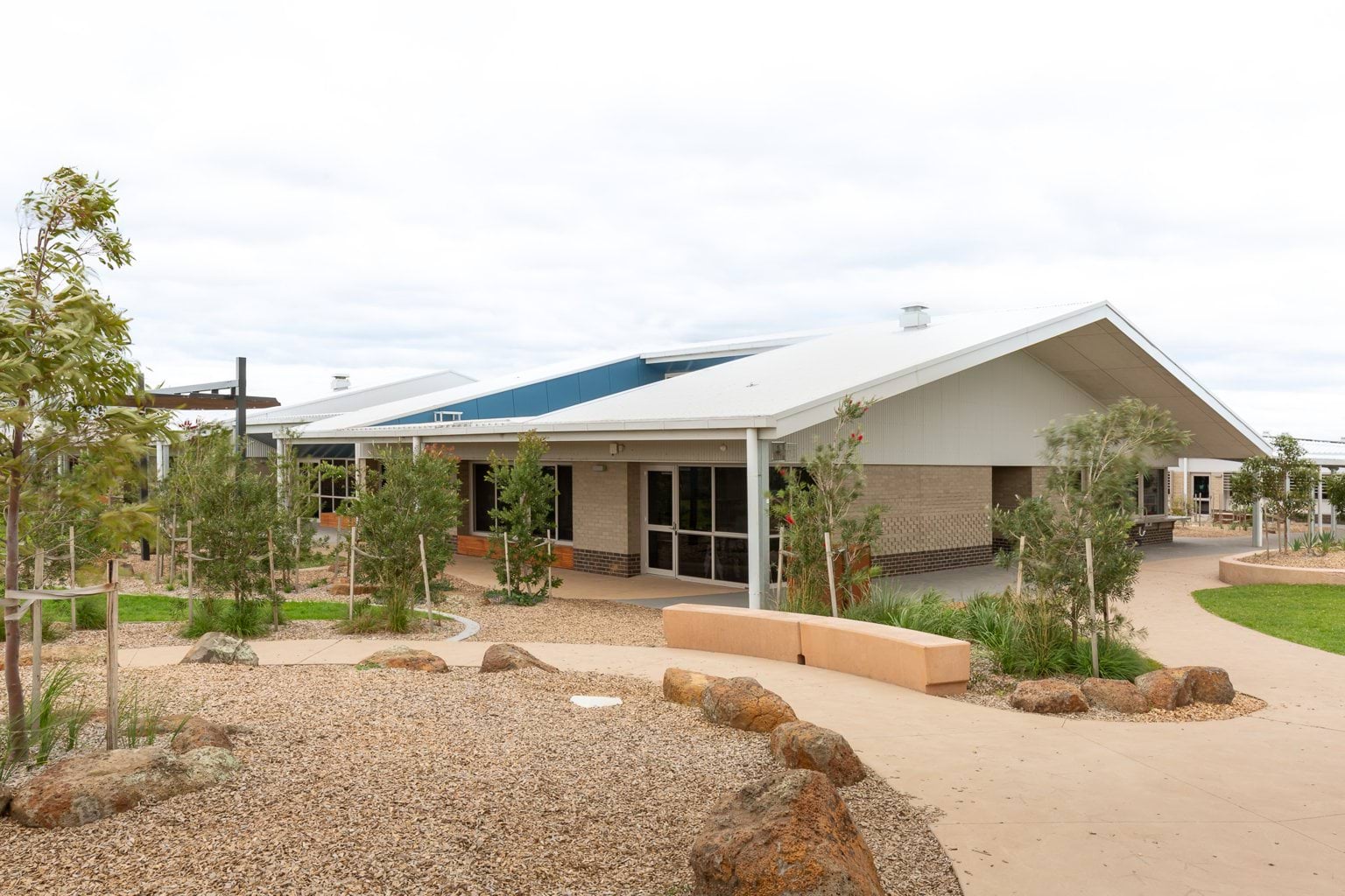 School building from outside garden and paved area